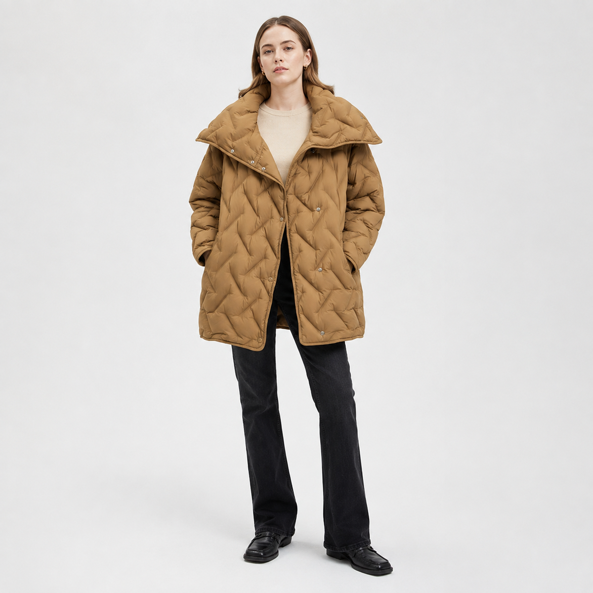 Woman wearing a camel women's diamond-quilted mid-length puffer jacket in a clean studio full-body view