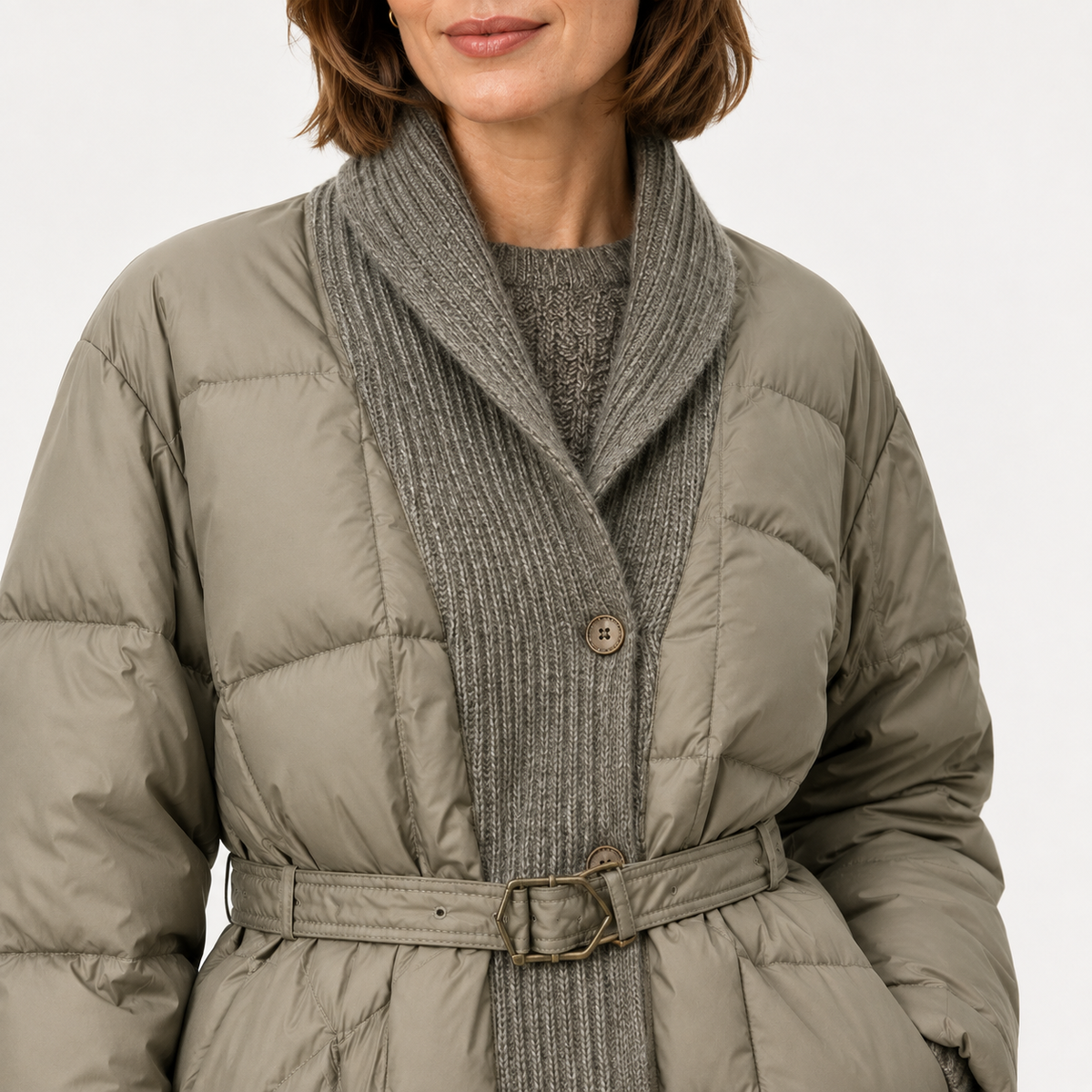 Close-up of shawl collar, button front and waist belt on the taupe women's belted puffer jacket